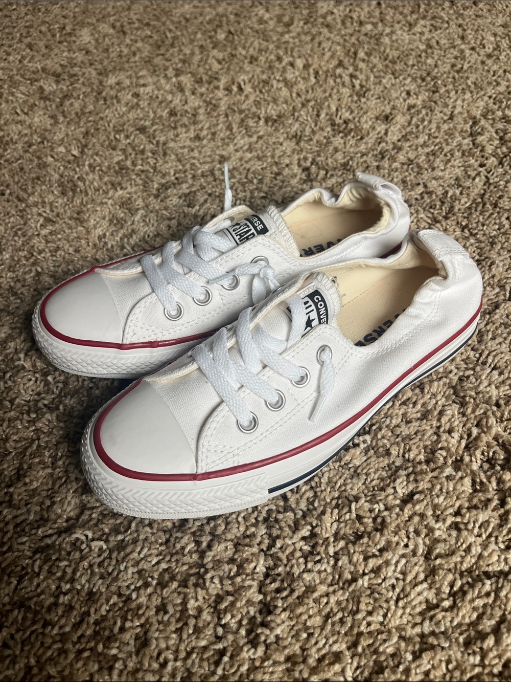 Converse White Slip-on Low-Top Sneakers with Red Trim